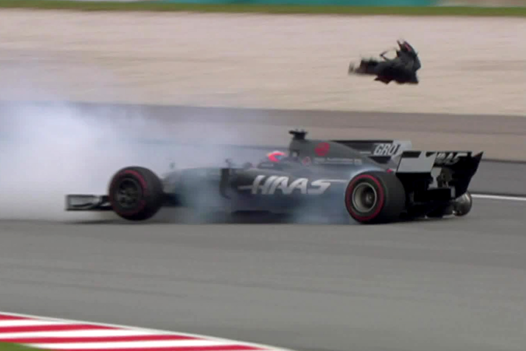 Romain Grosjean mid-crash at the 2017 Malaysian Grand Prix.