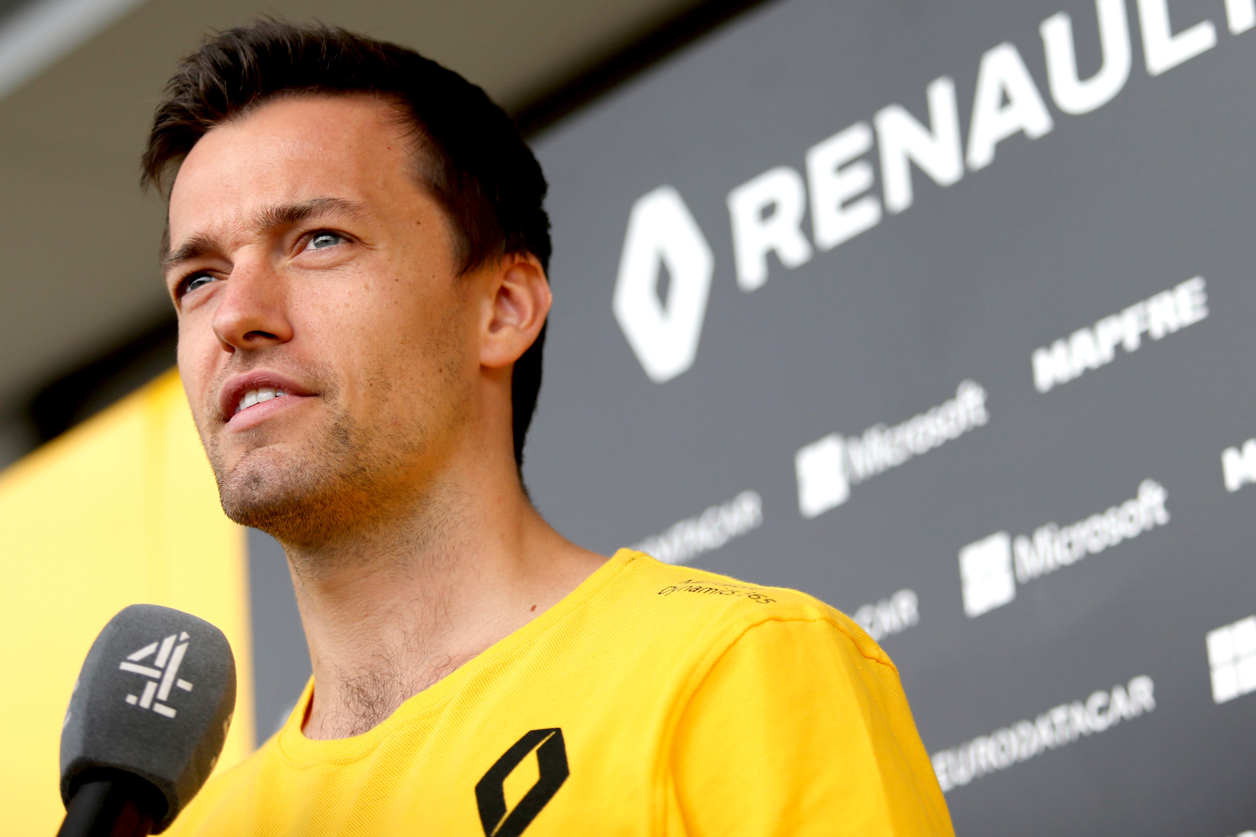 Jolyon Palmer speaks to reporters at the 2017 Japanese Grand Prix.