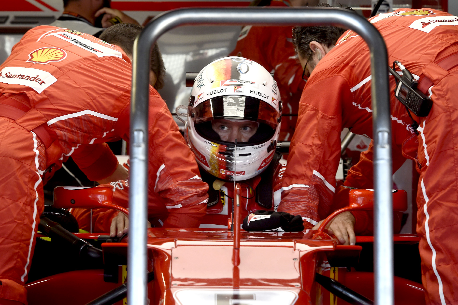 Sebastian Vettel climbs out of his car at the 2017 Japanese Grand Prix.