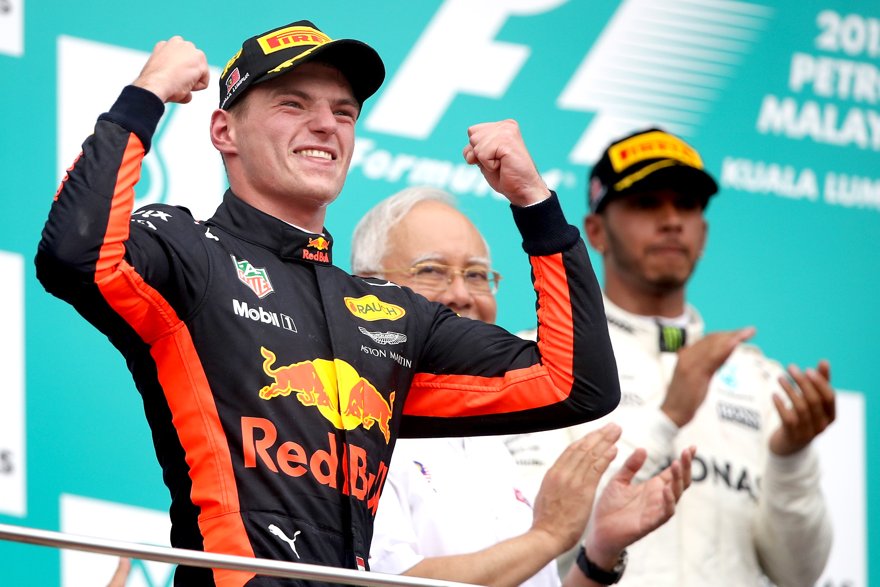 Max Verstappen celebrates on the 2017 Malaysian Grand Prix podium.
