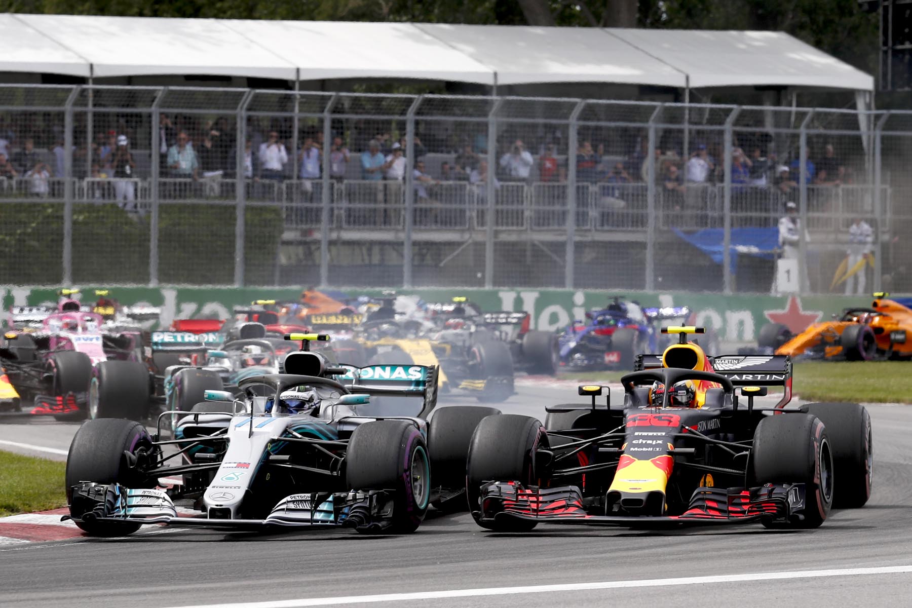 Valtteri Bottas and Max Verstappen race on track at the 2018 Canadian Grand Prix