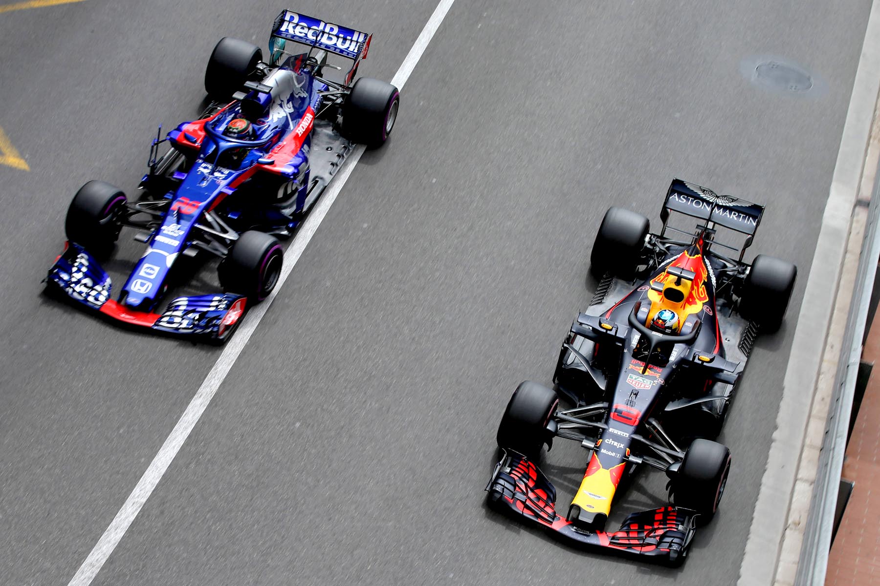 Toro Rosso's Brendon Hartley and Red Bull Racing's Daniel Ricciardo on track at the 2018 Monaco Grand Prix.