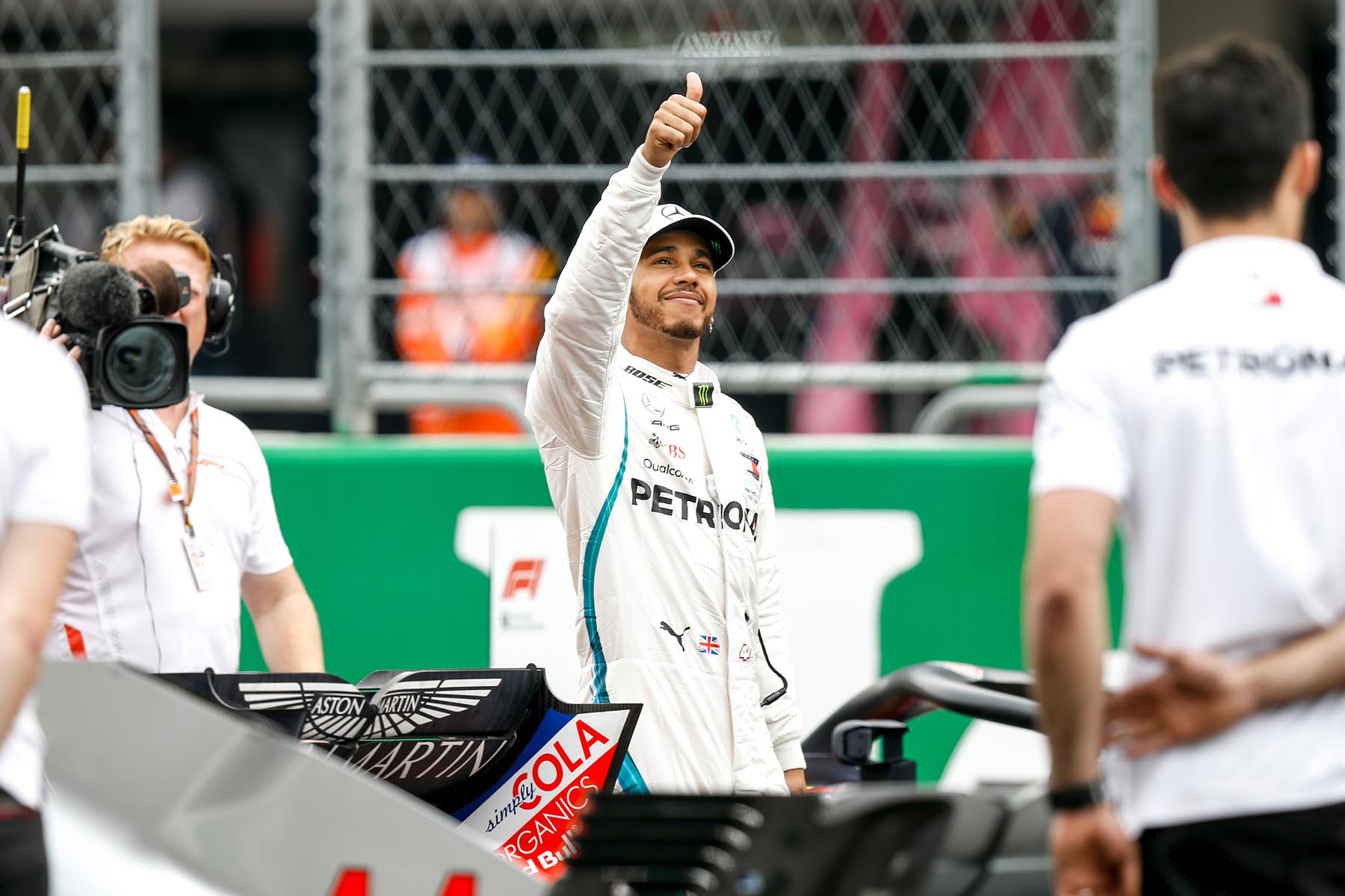 Lewis Hamilton waves to fans after qualifying third at the 2018 Mexican Grand Prix.