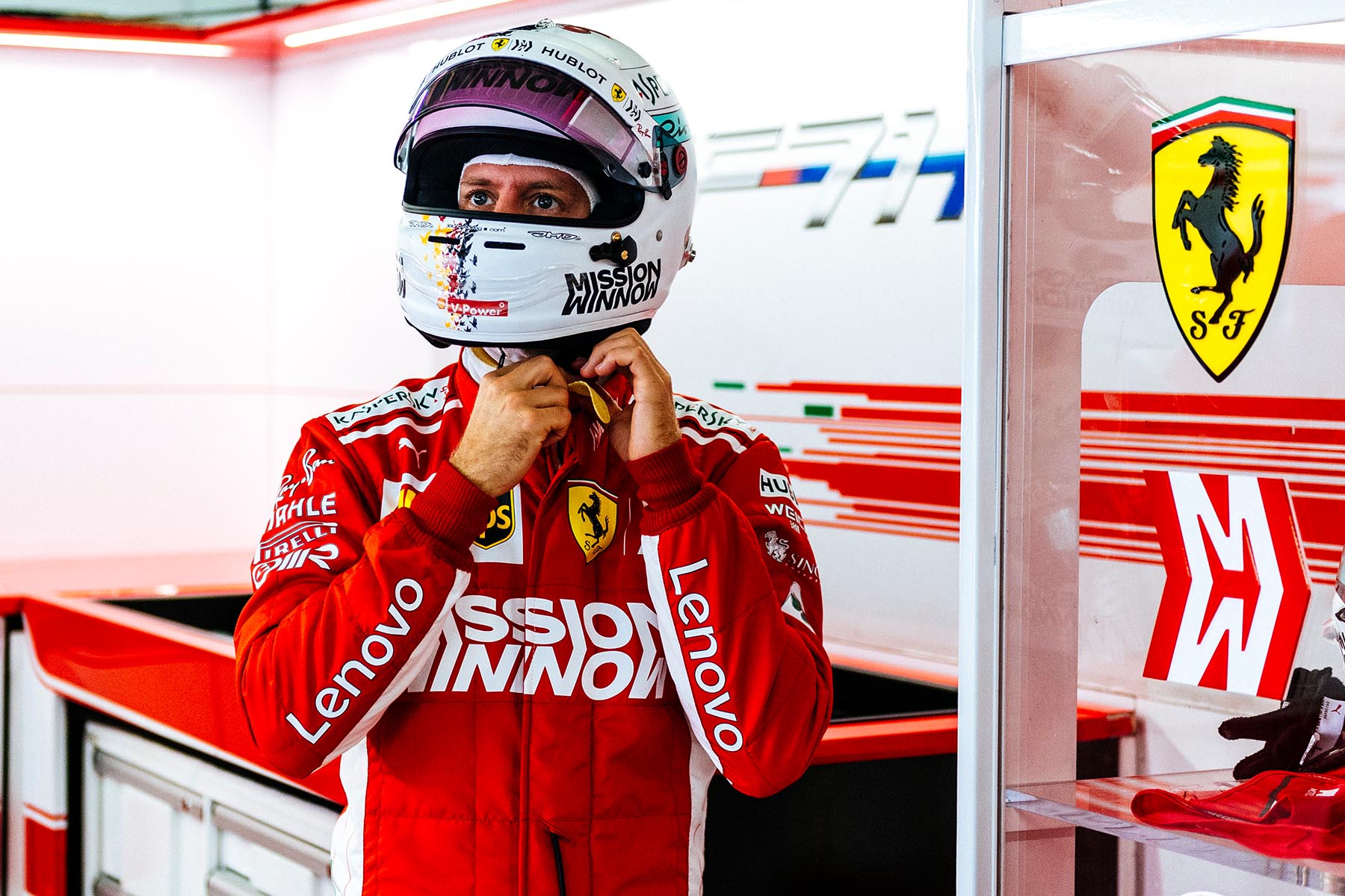 Sebastian Vettel in his garage at the 2018 Japanese Grand Prix.