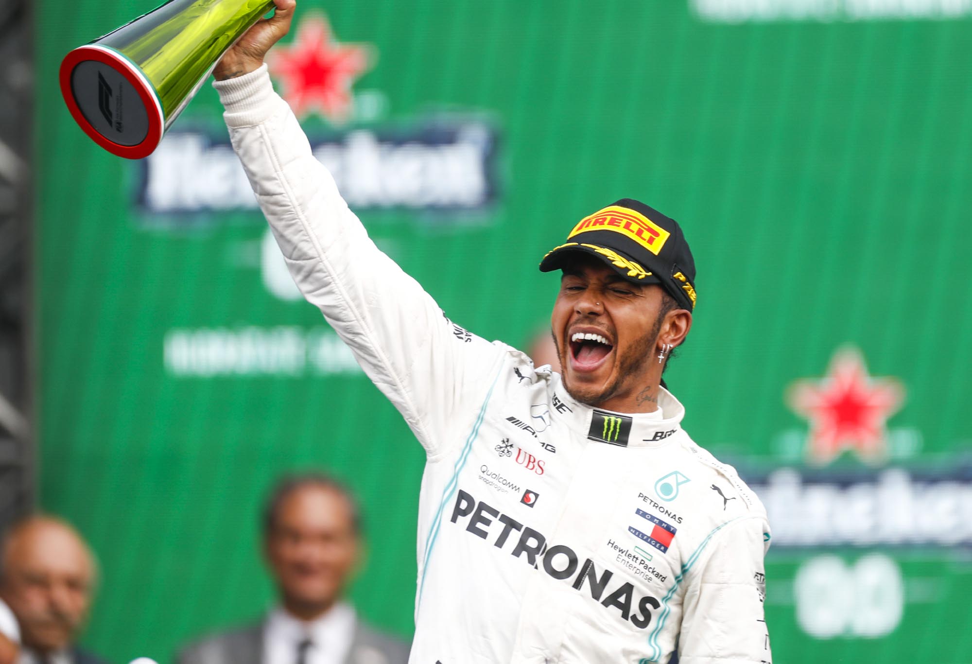 Lewis Hamilton celebrates on the podium at the 2019 Mexican Grand Prix.