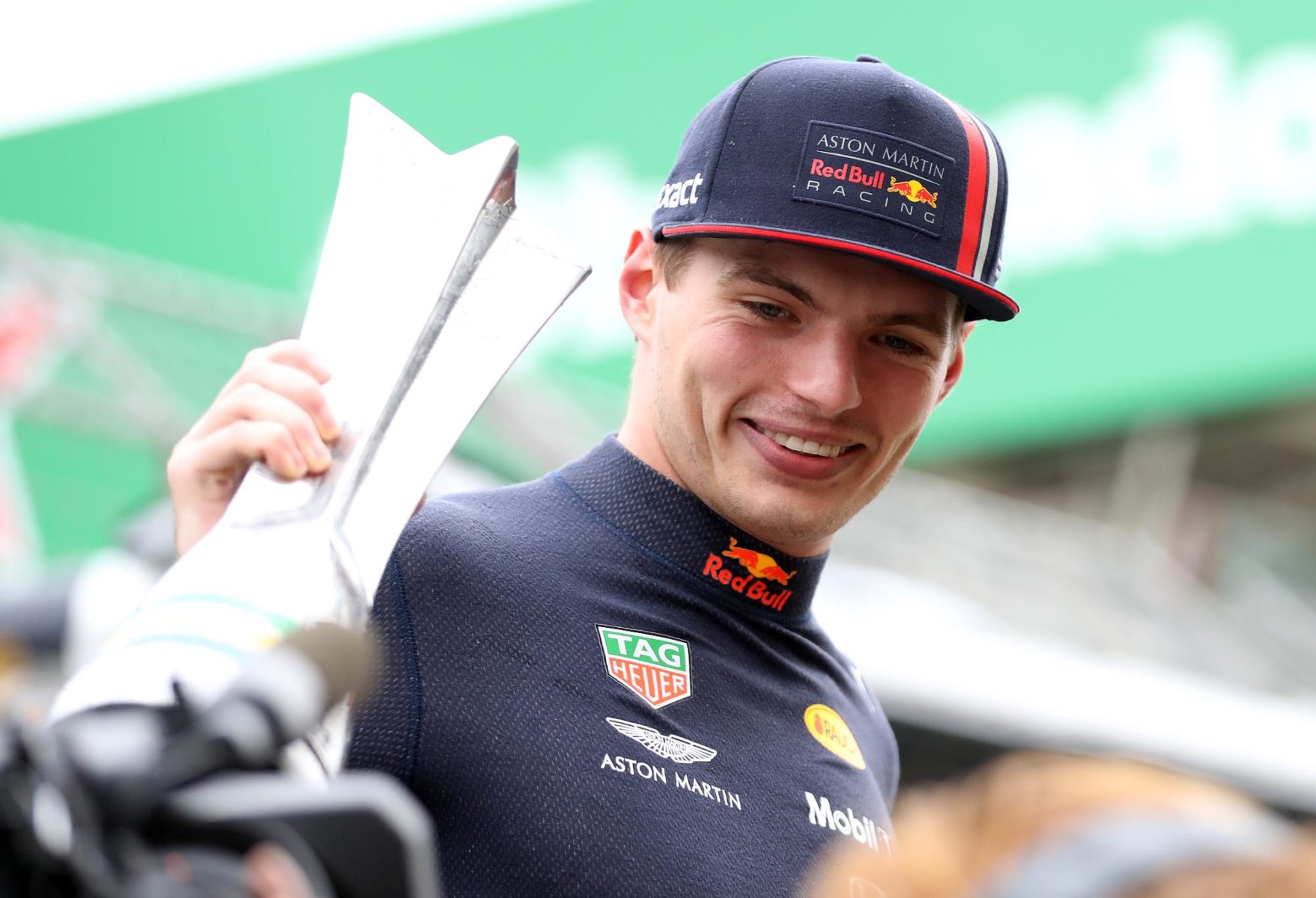 Max Verstappen holds the winners trophy at the 2019 Brazilian Grand Prix.